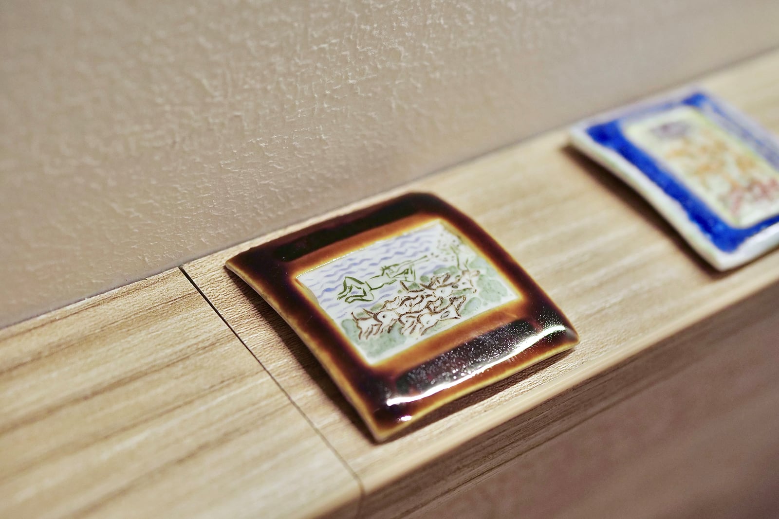 article image; primary-color: #AA9987;